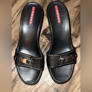 PRADA SPORT
Leather Push-Lock Sandals
